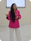 Trainer presenting to a seated audience